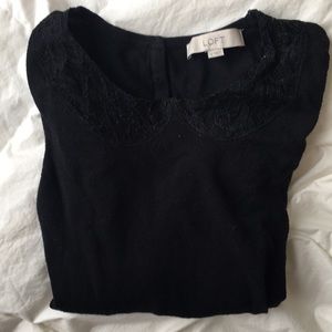 Quarter sleeve black blouse